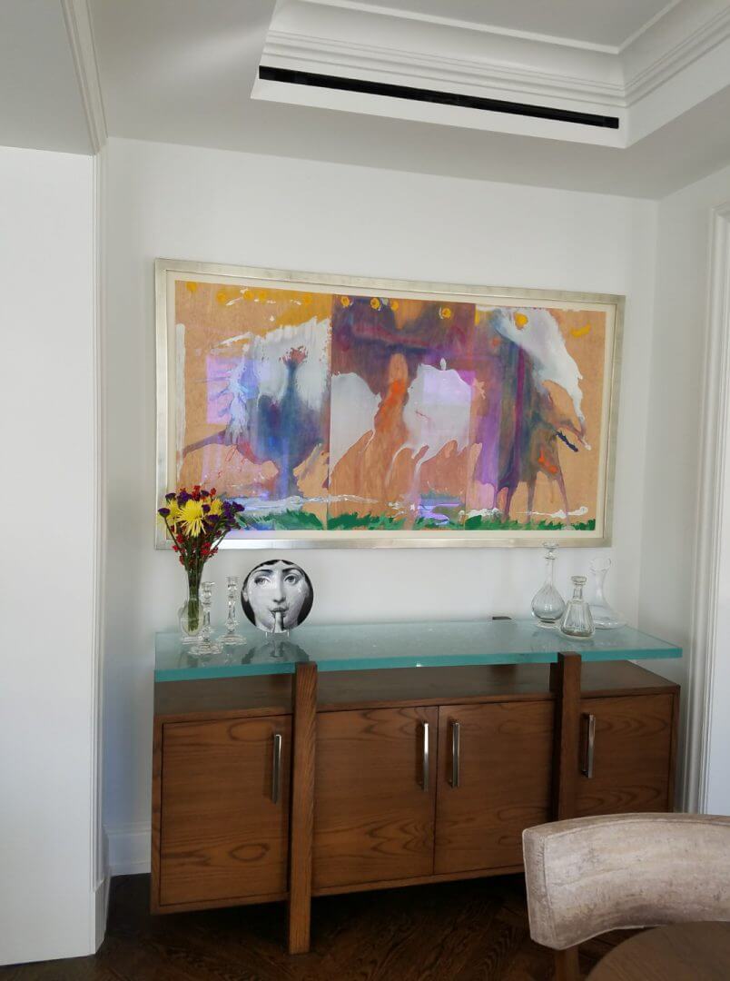 Colorful abstract painting with glassware and flowers on a wooden console, only available at Chelsea Art Group - New York City top trusted art advisers.
