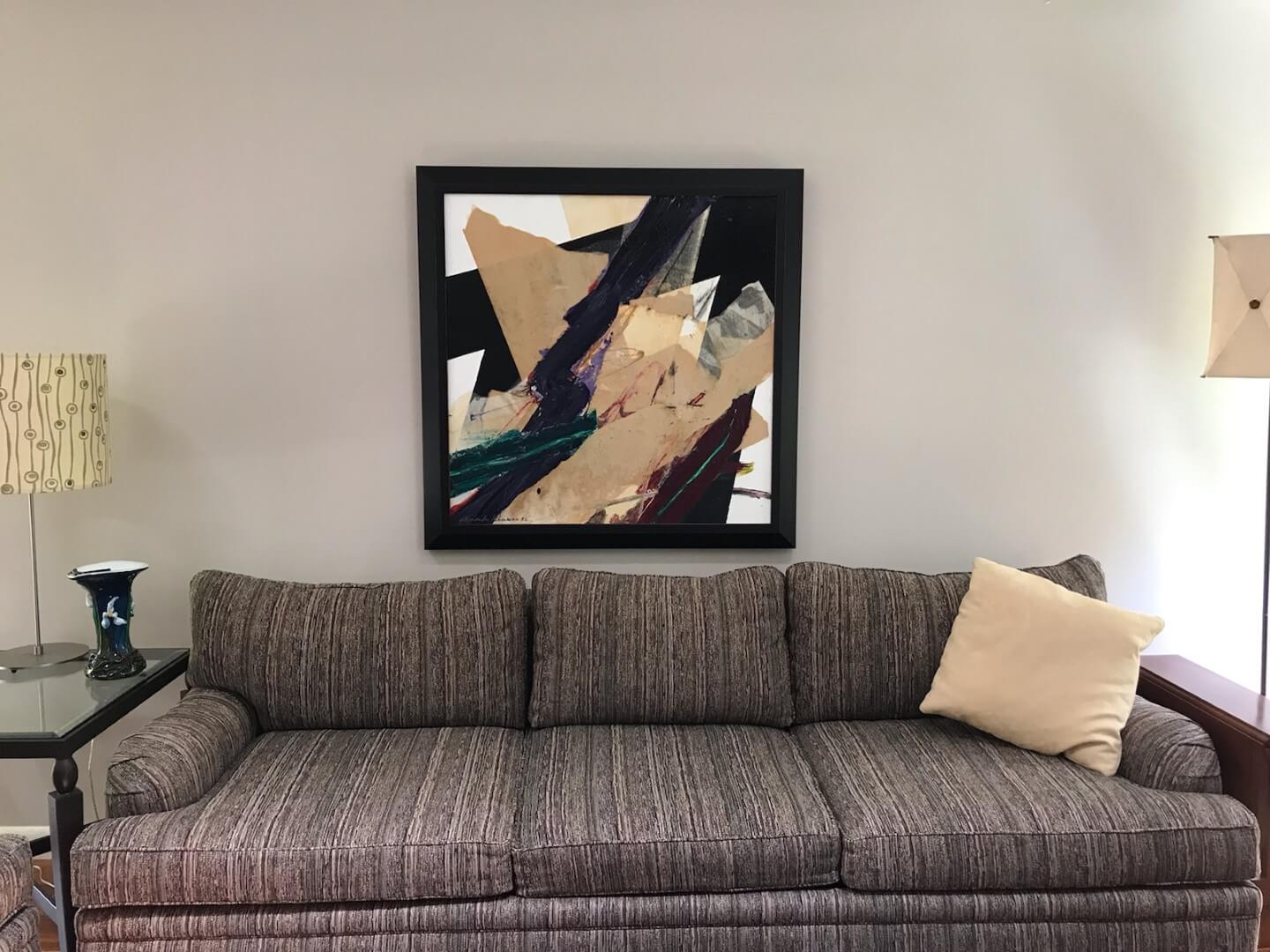 Abstract painting above a gray sofa in a modern living room, only available at Chelsea Art Group - New York City top trusted art advisers in conceptual art.