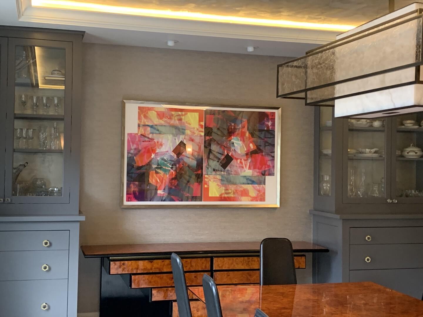 Colorful abstract painting on a dining room wall, available at Chelsea Art Group - New York City top trusted art advisers in conceptual, drawing, painting, photography and sculpture.