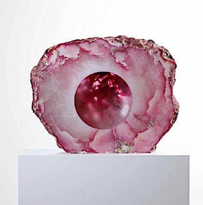 Stunning pink geode sculpture on display, only available at Chelsea Art Group - New York City top trusted art advisers in conceptual, drawing, painting, photography and sculpture.