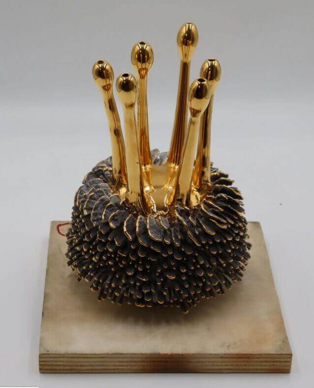 Golden sculpture 'Haas Brothers Girl 6', showcasing unique design, available at Chelsea Art Group - New York City top trusted art advisers.