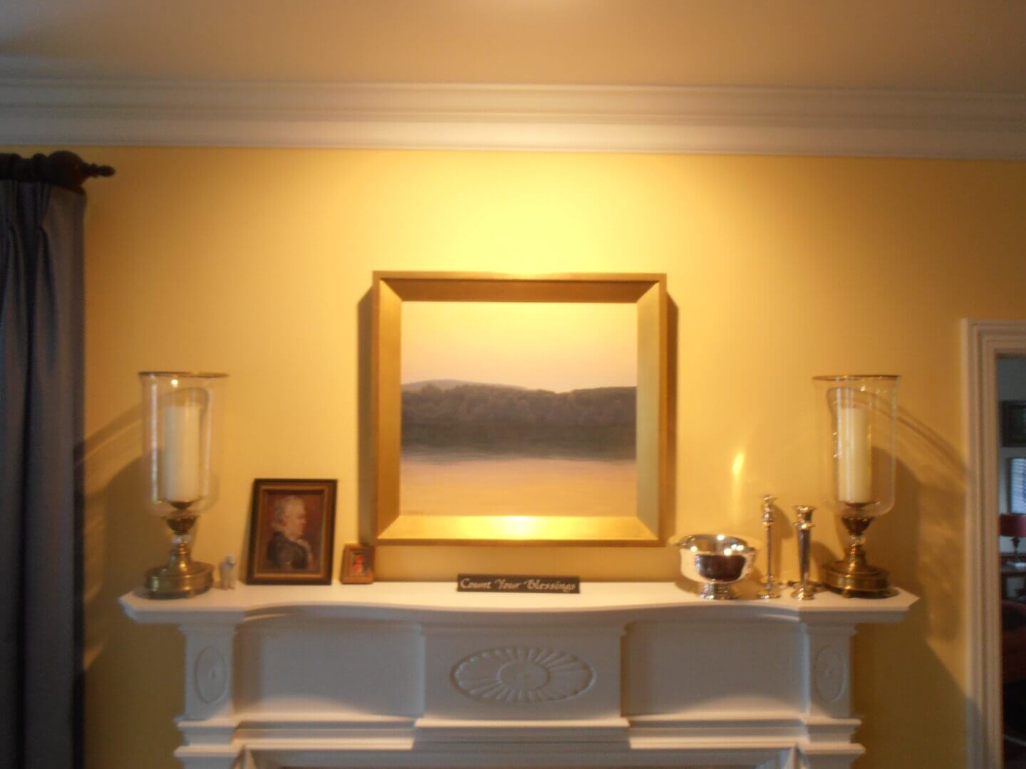 Painting above a mantel in a warmly lit room, only available at Chelsea Art Group - New York City top trusted art advisers in conceptual, drawing, painting, photography and sculpture.
